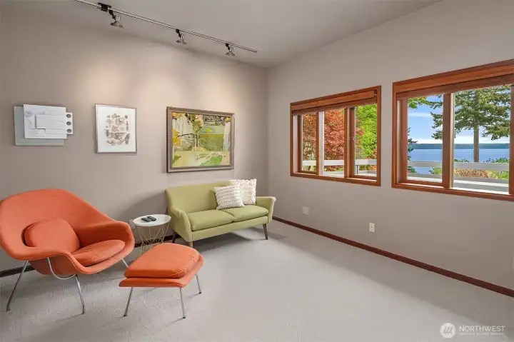 Light-filled upper-level flex room equally suited for media, office, or an inspiring work-from-home retreat.