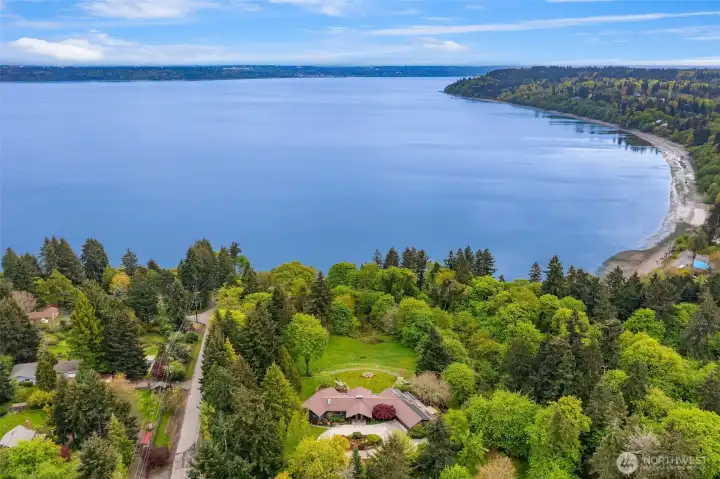 Ideally located near town, ferries, schools and beaches, with sweeping views over Tramp Harbor and Puget Sound.