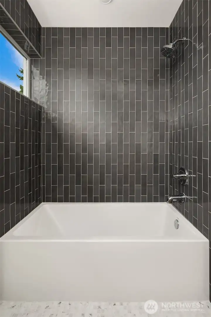 Tub with Tile Surround in Guest Bathroom Tub with Tile Surround in Guest Bathroom