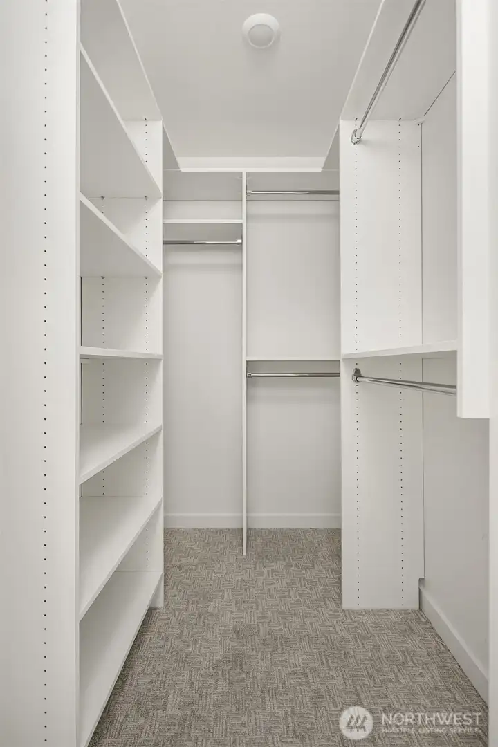Walk-in Primary Closet with Closet Systems Walk-in Primary Closet with Closet Systems