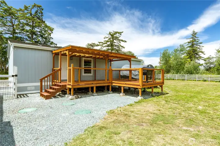 Newly built deck off the back to the huge backyard Newly built deck off the back to the huge backyard