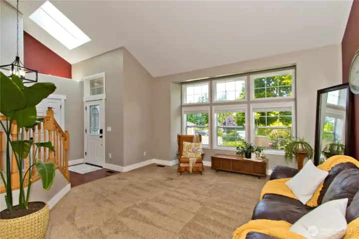 Welcoming front entry opens to a spacious front room, creating a seamless flow and inviting first impression. Welcoming front entry opens to a spacious front room, creating a seamless flow and inviting first impression.