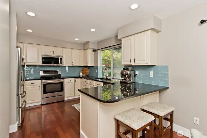 Enjoy the perfect blend of style and practicality in this classic kitchen, where all stainless steel appliances are included Enjoy the perfect blend of style and practicality in this classic kitchen, where all stainless steel appliances are included