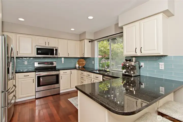 Beautiful granite countertops elevate the kitchen with their rich appearance and enduring appeal. Beautiful granite countertops elevate the kitchen with their rich appearance and enduring appeal.