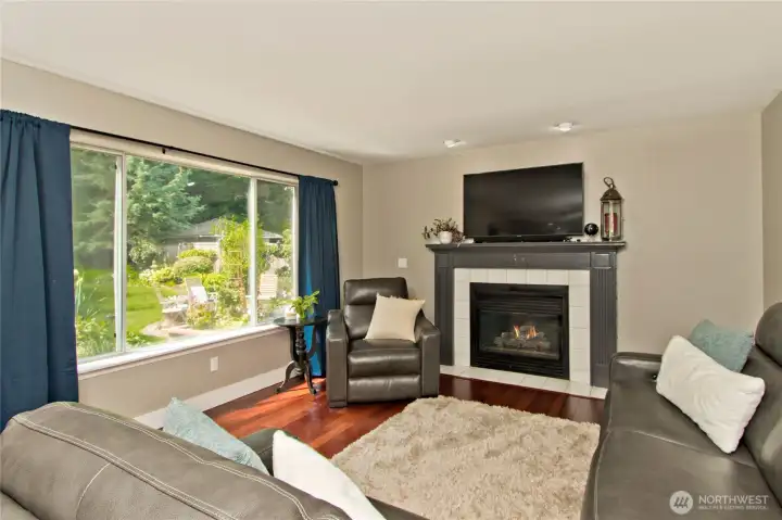 Enjoy the view of your secluded backyard from this cozy living room Enjoy the view of your secluded backyard from this cozy living room