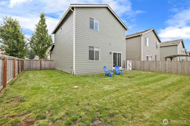 Fully fenced back yard with space to play or relax. Fully fenced back yard with space to play or relax.