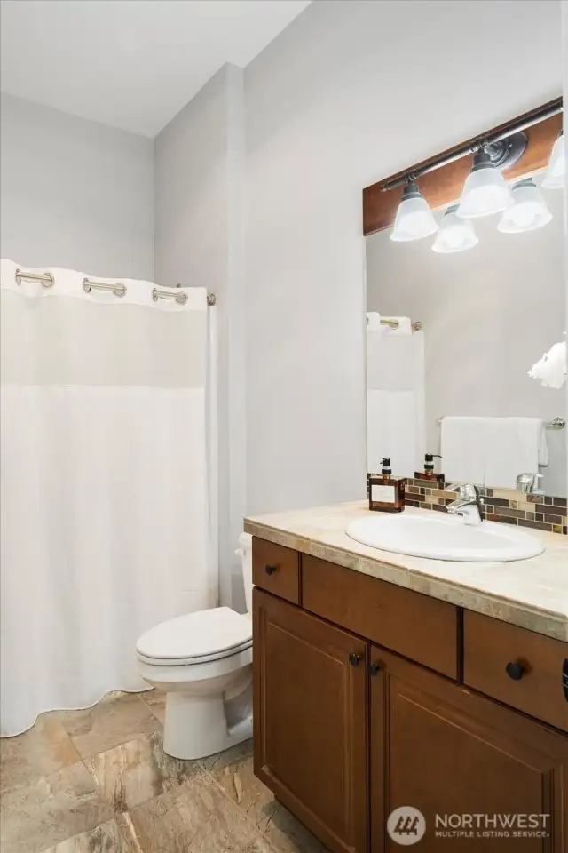 Main floor full-size bathroom