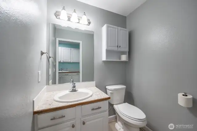 Convenience counts! This handy 1/2 bath is just steps away from the projects in you garage!