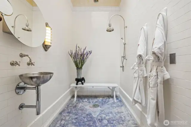 The bathroom is tiled without grout to eliminate maintenance, similar to the French Underground Metro.