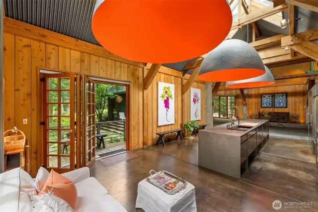 The island is not centered in the room. It was built and placed as restaurant kitchen, allowing a large area for entertaining guests near the kitchen.