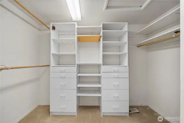 Large walk-in closet in Primary main floor bedroom