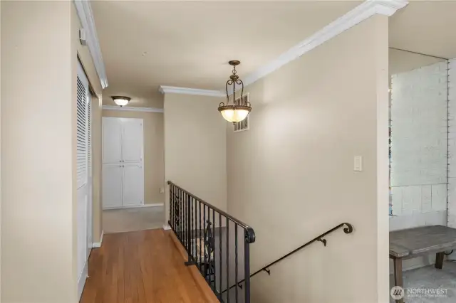 Main floor hallway and stairs to lower level
