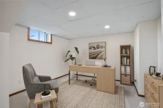 Fully finished basement offers a lot of space to use.  This room is set up as an office (no closet). Virtually staged.