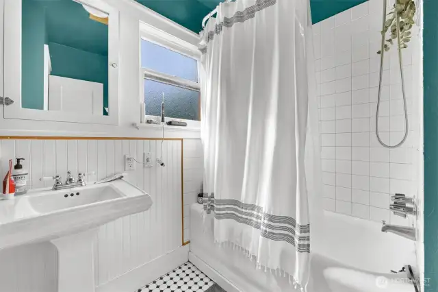 Full bath with a tub & shower