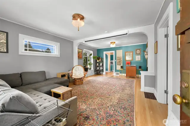 Spacious living room with built-ins & tons of character.