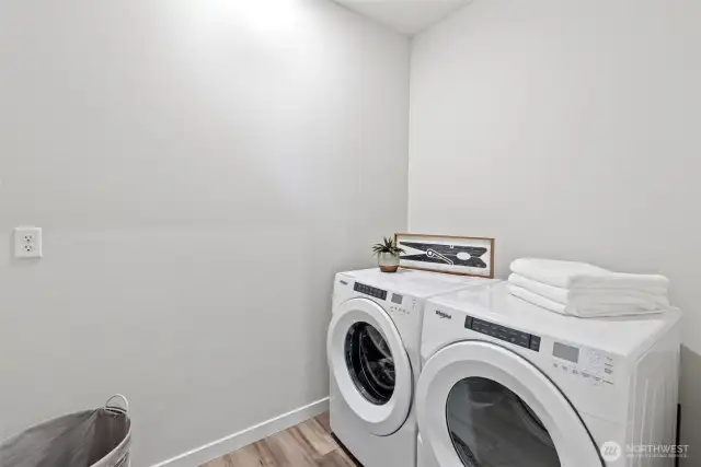 The large utility room is conveniently located between all the bedrooms, with virtually brand-new washer & dryer that still have stickers on them! The room is also stubbed for a future utility sink.