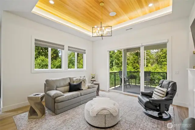 The windows frame the surrounding landscape like living art, bringing the beauty of the Pacific Northwest indoors in every season.