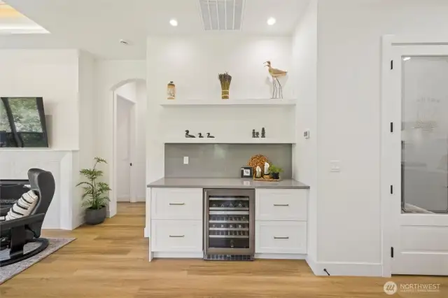 Built in Wine fridge and additional buffet counter space.
