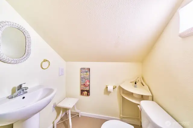 Upstairs half bath.