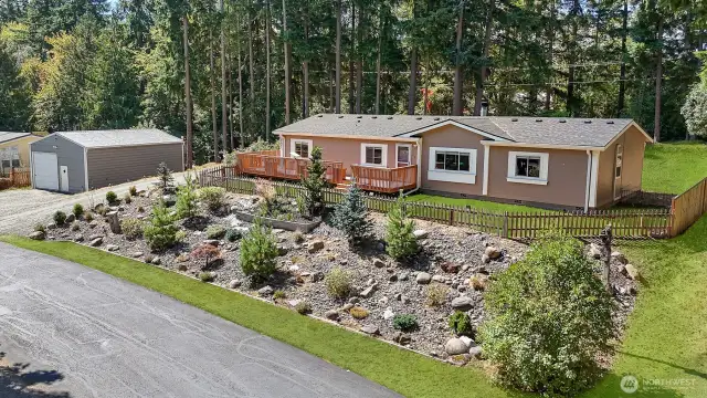 Explore the possibilities inside and out at this spacious home on a large lot, with a shop! Lawn has been edited for photography purposes.