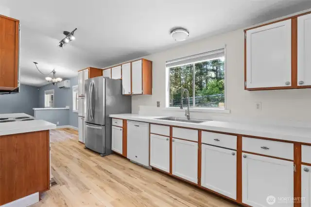 Storage is no issue in this kitchen! The cabinets also feature space above for additional storage or decor.