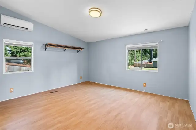 Another view of the primary bedroom. Have you noticed the vaulted ceilings and two tone painting throughout?