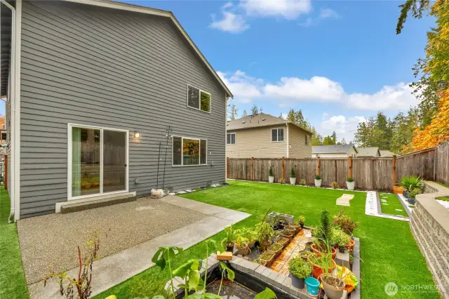 Another angle of backyard area