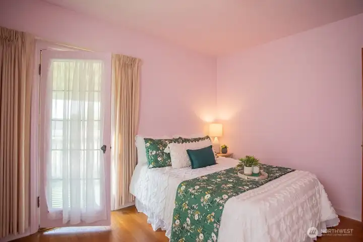 Main bedroom with door out to deck