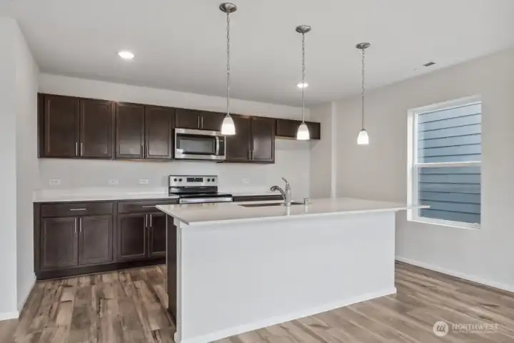 Pictures are of the same floor plan but in a different community. Finishes may vary.