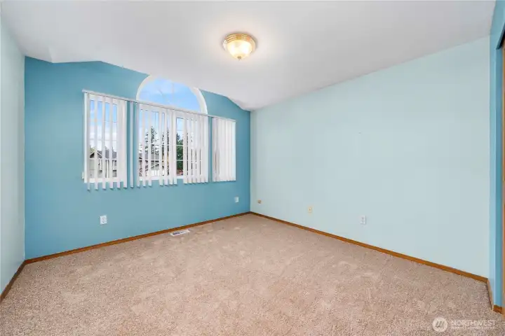 Open nice size bedroom with natural light