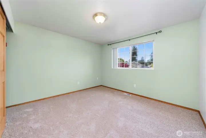 Second bedroom is a comfortable and well-proportioned space.
