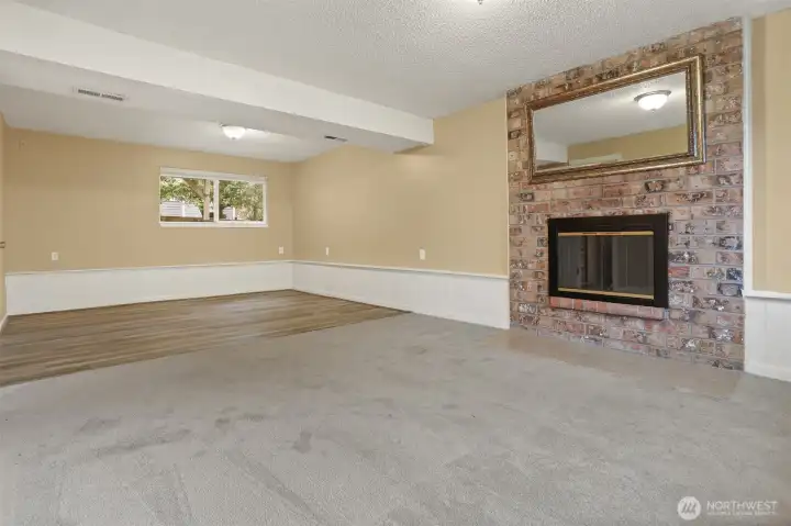 Lower level rec room with room for office too!