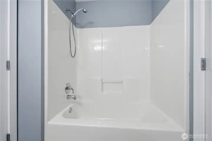 Tub shower combo in hall bath
