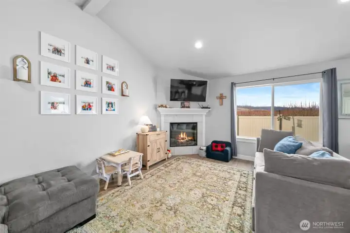 Living area with gas fireplace.