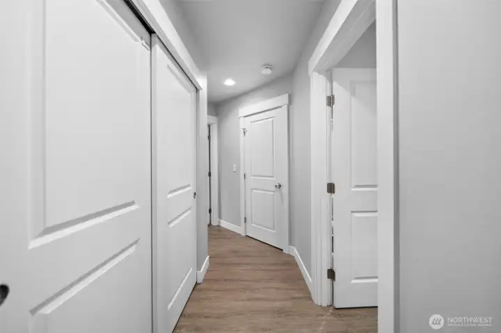 Hall to additional bedrooms.