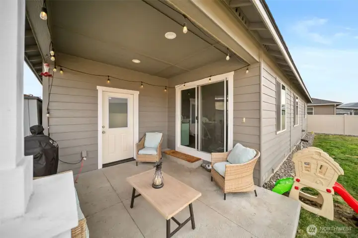 Covered porch, perfect for entertaining.