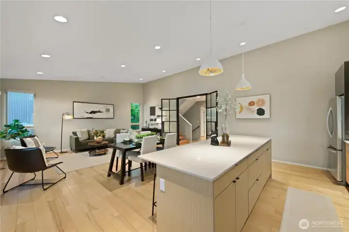 This photo shows once more the open & light-filled nature of this room.