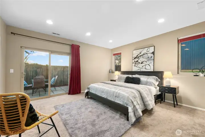 The primary bedroom is large, comfortable and will easily hold a king or queen bed, two night-stand and a sitting area. This bedroom is away from the lively main floor for great quiet and privacy.