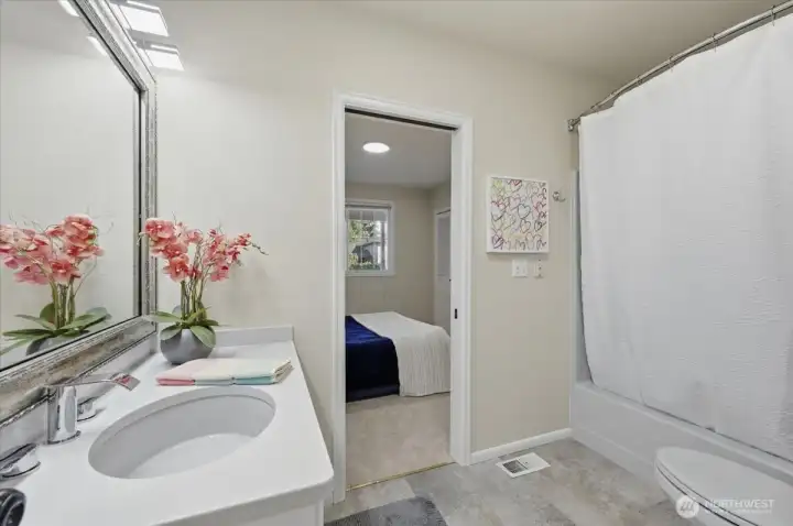 Full Bath Opening into Main Floor Bedroom