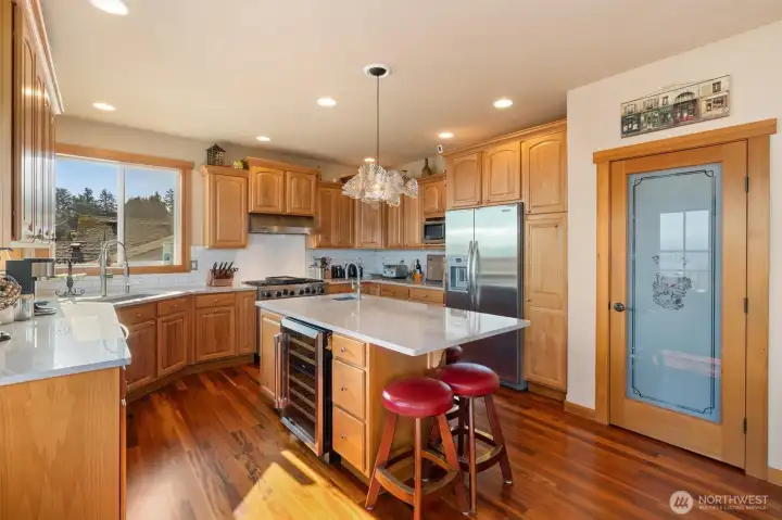 Granite Counters, Tigerwood floors, large pantry
