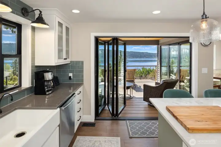 Remodeled kitchen; Quartz island, Thermador Gas Cooktop, GE Cafe double oven, microwave drawer, Bosch refrigerator/dishwasher, and pantry.