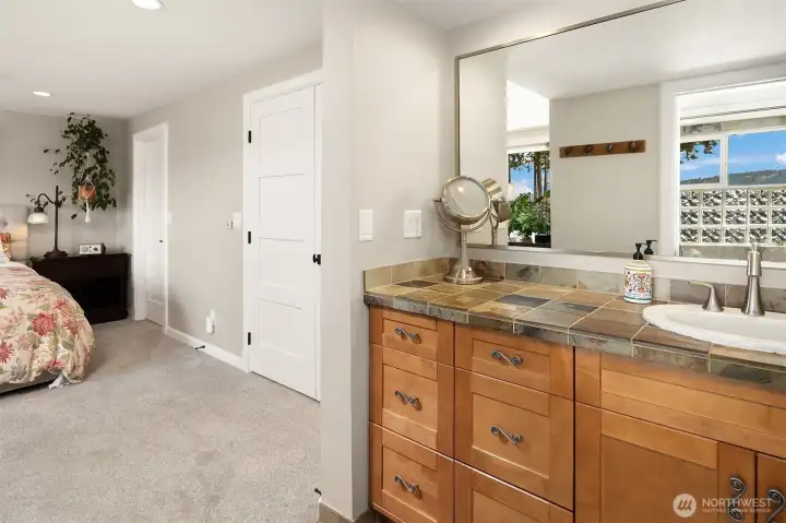 3 bedrooms on the main level includes the relaxing primary suite, expansive ensuite bath, large walk-in closet and private view deck.