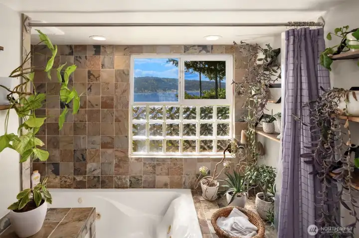 3 bedrooms on the main level includes the relaxing primary suite, expansive ensuite bath, large walk-in closet and private view deck.