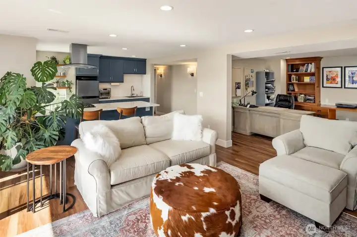 A perfect setup for extended family or guests downstairs with a Brand new, second, full kitchen with custom cherry cabinets. Large double recreation room with a gas fireplace, built-ins, with two desks-perfect for kids & homework. Huge laundry room. Relaxing steam shower. Double doors to lower decks.