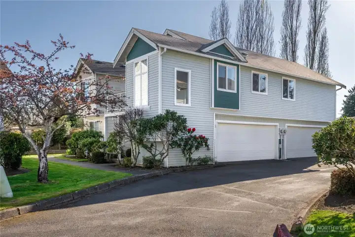 Corner Condo w/2 car garage