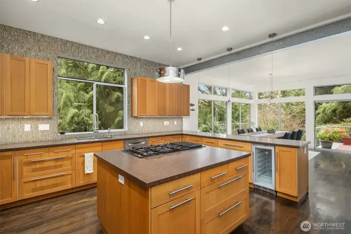 Central island offers prep space and gathering point.