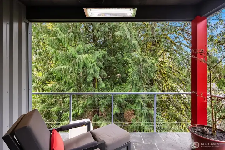 A private covered deck off the primary bedroom.