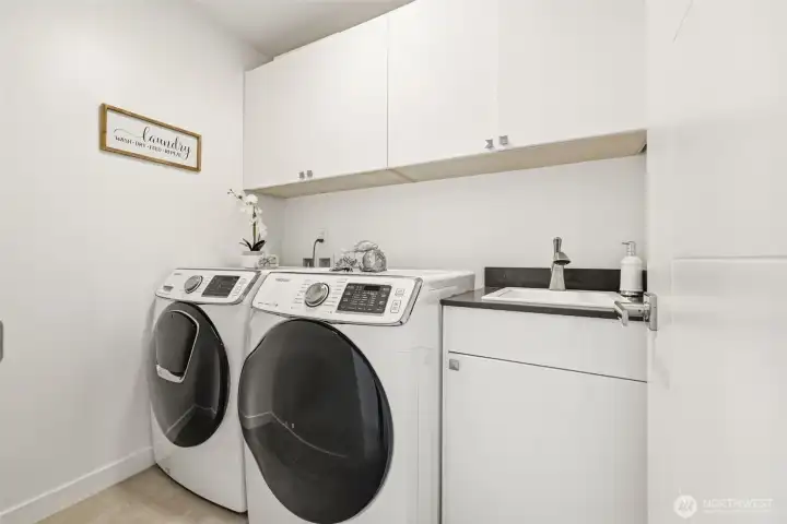 Washer & dryer in the laundry room on the 2nd level, just outside of the primary suite.