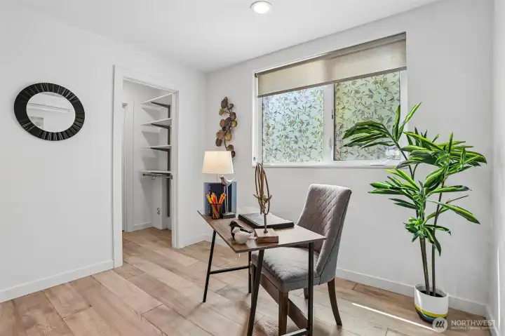 Air conditioned back bedroom (or office/den/bonus room) on the first level.