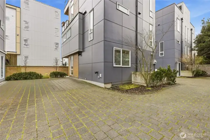 Parking pad with EV charger.